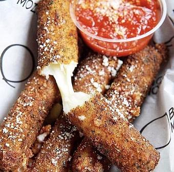 Product: (4) 5 inch sticks.  Served with a side of Marinara for dipping. - Brown Dog Pizza in Downtown Telluride, Main Street - Telluride, CO Bars & Grills