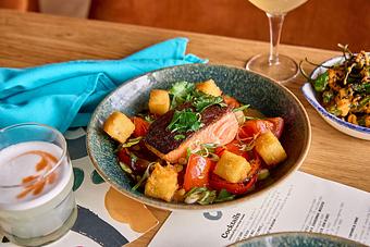 Product: Salmon Saltado - Cabra in Chicago, IL American Restaurants