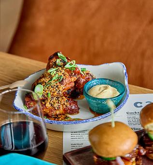 Product: Spicy Sticky Wings - Cabra in Chicago, IL American Restaurants