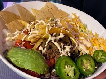 Product: Fiesta with us and savor our taco salad delight! - Geddy's in Downtown Bar Harbor, just steps from the town pier. - Bar Harbor, ME American Restaurants