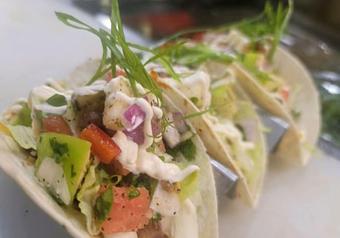 Product: Fresh, flavorful, and packed with a kick - our Ahi tuna tacos are the perfect bite! Taco Time! - Geddy's in Downtown Bar Harbor, just steps from the town pier. - Bar Harbor, ME American Restaurants