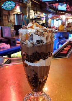 Product: Indulgence at its finest - the ultimate Chocolate Death Parfait. Decadent, rich, and absolutely irresistible! - Geddy's in Downtown Bar Harbor, just steps from the town pier. - Bar Harbor, ME American Restaurants