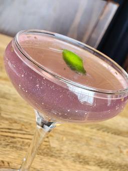 Product: Honey Lavender, Empress® Gin, Tonic, Edible Glitter. - Harvey's Grill and Bar in Saginaw, MI American Restaurants