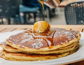 Product: housemade buttermilk pancakes served with warm maple syrup and whipped butter. available in 1, 2 or 3 pancakes - Hub 51 in River North - Chicago, IL American Restaurants