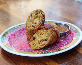 Product: housemade egg roll filled with chicken, cabbage and carrots, served with sweet and sour sauce - Hub 51 in River North - Chicago, IL American Restaurants