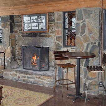 Interior: Restaurant Lobby.  The restaurant offers three working fireplaces. - Chateau Morrisette Winery and Restaurant in Floyd, VA American Restaurants