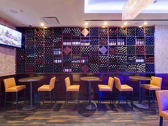 Interior: wine wall - Empire Steak House in New York, NY American Restaurants