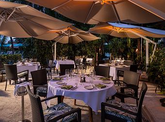 Interior: Essensia Poolside Terrace Evening - Essensia Restaurant at The Palms Hotel & Spa in Miami Beach - Miami Beach, FL Global Restaurant