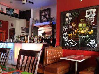 Interior: Estrella Negra Interior/ Beautiful Artwork - Estrella Negra in Logan Square/ Bucktown border - Chicago, IL Latin American Restaurants