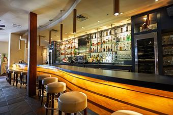 Interior: GW Fins' full service bar - GW Fins in French Quarter - New Orleans, LA Seafood Restaurants