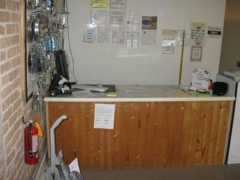 Interior: Service counter after moved in - Heckey's Computers & Vacuum Services in Waupaca, WI Vacuum Cleaners