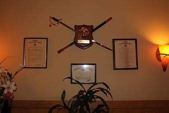 Interior: USMC warrants for Capt Stewart; USMC NCO sword - Indochine in Mid-Town - Palo Alto, CA Thai Restaurants