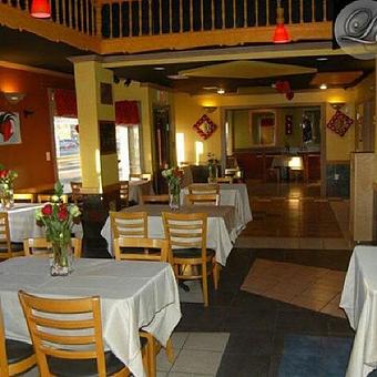 Interior - La Perle Caribbean in Everett, MA American Restaurants