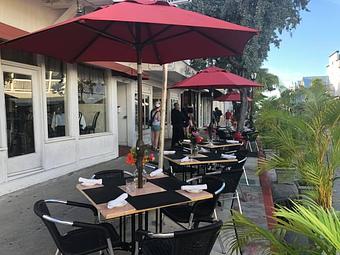 Interior: Join us for Mall on Duval every Friday and Saturday night and dine outside! - La Trattoria Restaurant in Old Town - Key West, FL Bars & Grills