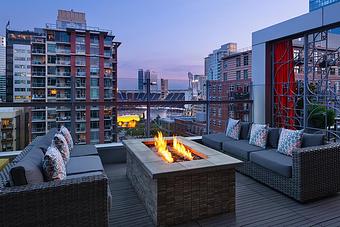 Interior: Grab a fire pit and your favorite beverage and enjoy the view! - Level 9 Rooftop Bar in East Village - San Diego, CA American Restaurants