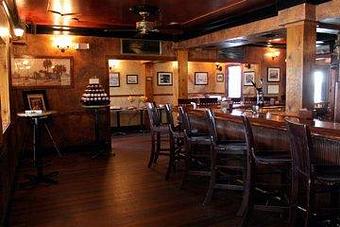Interior: Our downstairs whiskey bar - Mainstreet Pub in Historic Downtown Melbourne - Melbourne, FL Pubs