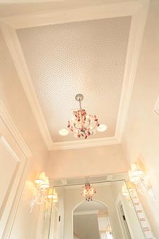 Interior: It's all in the details.  Chic polka dot wallpaper on the ceiling create a simple and elegant feel.  Wallpaper selections available from Panache - Panache in Wolflin Village - Amarillo, TX Business Services
