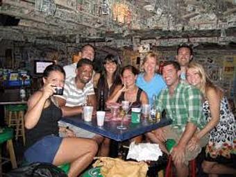 Interior: Everyone makes friends at Siesta Key Oyster Bar - Siesta Key Oyster Bar in Sarasota, FL Seafood Restaurants