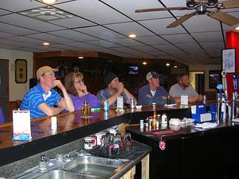 Interior: Intense group during last year's NCAA tourney. - Station 53 Bar & Grill in Sublette, KS Restaurants/Food & Dining