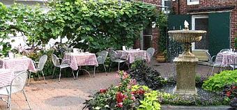 Interior: From April/May to October Stellina serves our entire menu Al Fresco in our Italian garden, complete with sprawling grape vines and bubbling fountain. - Stellina in Watertown, MA Italian Restaurants