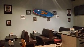 Interior: Get comfy, eat & relax!!  Take one home for later!! - Surfwiches Sandwich Shop in Jacksonville Beach - Jacksonville Beach, FL American Restaurants