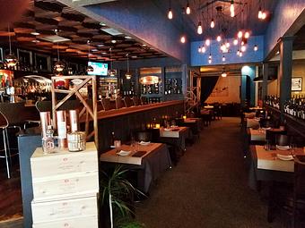 Interior: Backroom and dining room - Tavolo Wine Bar & Tuscan Grille in Smithfield, RI Italian Restaurants