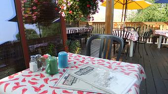 Interior: Seating on the deck - The Breadboard Restaurant in Ashland, OR Restaurants/Food & Dining