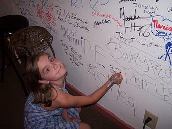Interior: If you sing you can sign the Wall - Words AfterWords in Smack in the Middle of Old Hardy Town - Hardy, AR American Restaurants