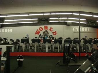 Interior: Front Cardio Area - World Gym Fitness Center in Tracy, CA Health Clubs & Gymnasiums