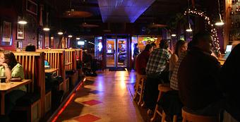 Interior: Dining Room & Bar - Zanzibar Restaurant & Pub in Menomonie, WI American Restaurants