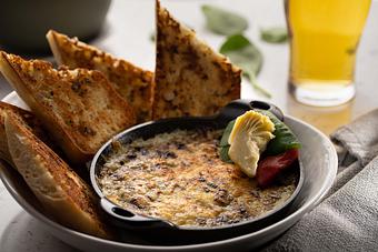 Product: Baby Spinach, Artichoke Hearts, Parmesan, House Bread - 22 & Vine in Riverside, IA American Restaurants