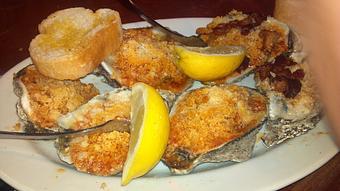 Product: Chargrilled Oysters - Adventures Pub & Spirits in Downtown Biloxiu - Biloxi, MS Pubs