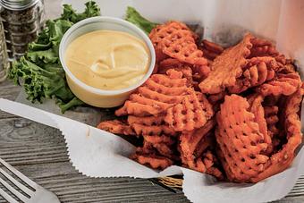 Product: Sweet Patatoe Waffle Fries - Adventures Pub & Spirits in Downtown Biloxiu - Biloxi, MS Pubs