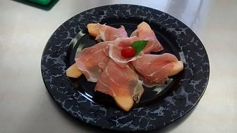 Product: Parma prosciutto with melon. - Art Caffe in Venice, FL Italian Restaurants