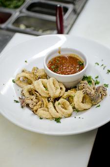 Product: Fried Calamari with Arturo's marinara sauce - Arturo Boada Cuisine in Tanglewood - Memorial  - Houston, TX American Restaurants