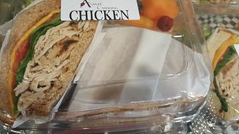 Product: Our chicken sandwich is made from freshly sliced chicken that we grill daily! - Asante Catering in Sacramento, CA American Restaurants