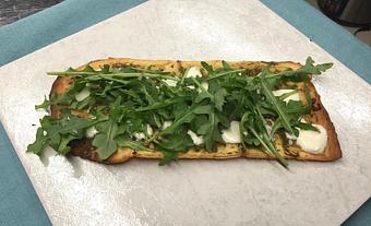 Product: Walnut Arugula Pesto Flatbread - Bacchae Wine Bar in Cape Canaveral - Cape Canaveral, FL Bars & Grills