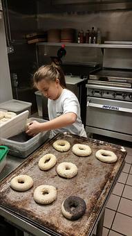 Product: cutie pie Bella helping roll bagels - Bella Leigh Bakery & Cafe in Montague, NJ Bakeries