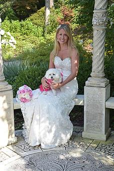 Product: Bride posing w/ her white dog at the New Hanover County Arboretum. Wilmington, NC - Billy Beach Photography in The Kerridor - Wilmington, NC Photography