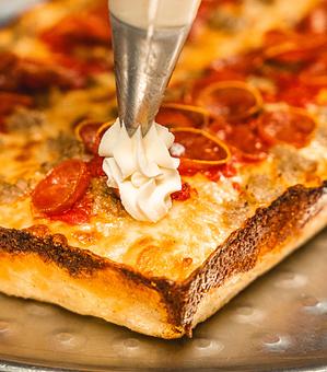 Product: Brooklyn Bridge - Detroit Style Pizza - ricotta pipping - Blue Pan Pizza in South Golden - Golden, CO American Restaurants