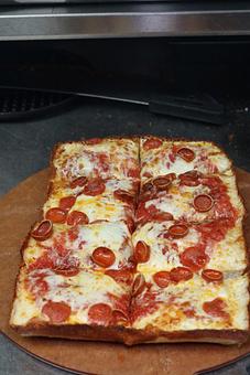 Product: Detroit-style pizza - cupping pepperoni thin cut - Blue Pan Pizza in Congress Park - Denver, CO Dessert Restaurants