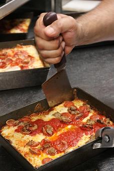 Product: Detroit-style pizza in pan - Blue Pan Pizza in Congress Park - Denver, CO Dessert Restaurants