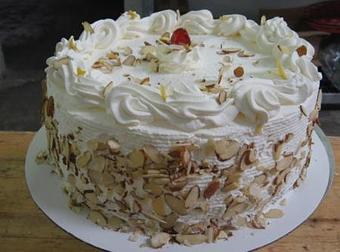 Product: Italian Rum Cake - Botto’s Bakery in East Deering - Portland, ME Bakeries