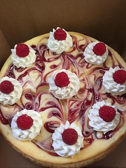 Product: Raspberry Swirl Cheesecake - Botto’s Bakery in East Deering - Portland, ME Bakeries