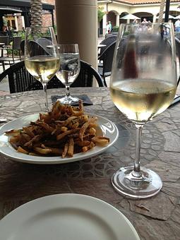 Product: Hand-cut fries with truffle oil and parmesan - BRIX Wine Cellars in Houston, TX American Restaurants