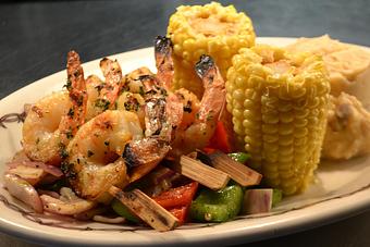 Product: A healthy option with grilled shrimp. - Buffalo Phil's Pizza & Grille in The Waterpark Capital of the World- Wisconsin Dells! - Wisconsin Dells, WI American Restaurants