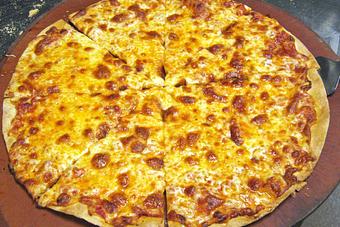 Product: Add toppings to our Small 12" Cheese Pizza, then choose thin or thick crust. - Buffalo Phil's Pizza & Grille in The Waterpark Capital of the World- Wisconsin Dells! - Wisconsin Dells, WI American Restaurants