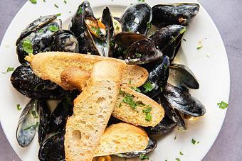 Product: Mussels Poulette - Cal's Wood-Fired Grill & Wine Bar in West Springfield, MA Bars & Grills