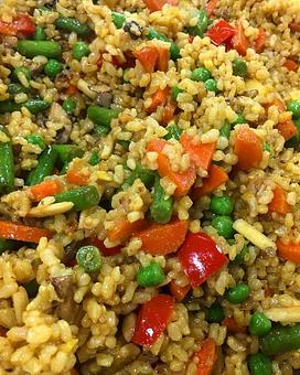 Product: Vegan Fried Rice  - turnips, carrots, mushrooms, peas, and onions and rice seasoned with ginger, cardamom, garlic, lime juice, Braggs amino acids fried with sesame oil. Topped with almonds, zucchini, and cilantro - Canihaveabite in Plaza - Kansas City, MO Health Food Restaurants