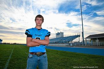 Product: Senior football photos - Captured Moments Photography in MANHATTAN, KS Misc Photographers